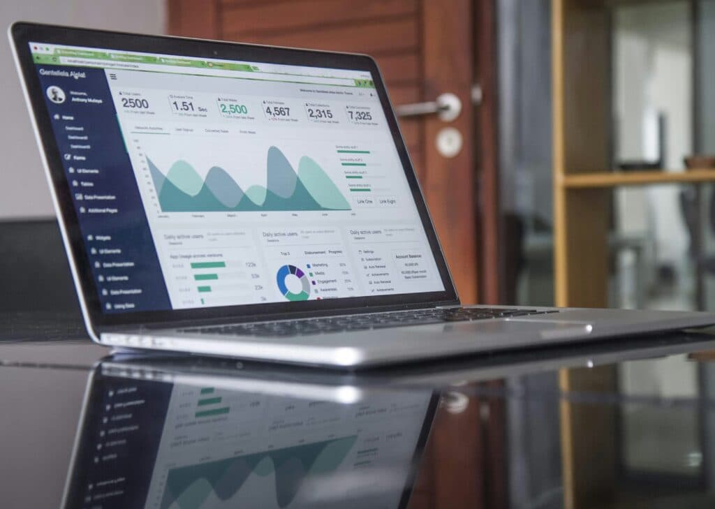 Professional working with customer data and analytics alongside CRM workflows