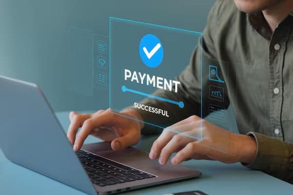 A successful payment experience shown across a fintech workflow.