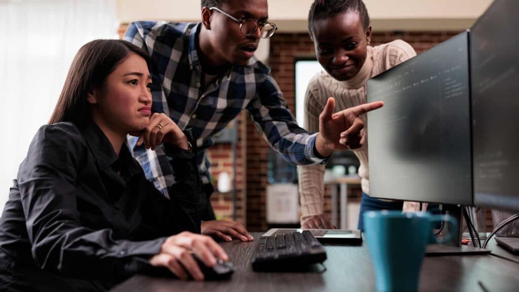 Team collaboration inside a growing small business.